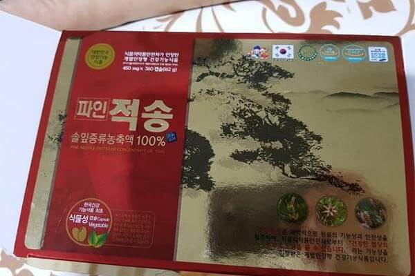 cách dùng dầu thông đỏ